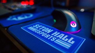 Seton Hall Esports branded mousepad and mouse.