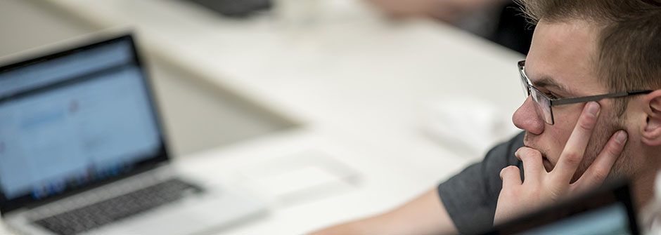 A student sitting at a computer