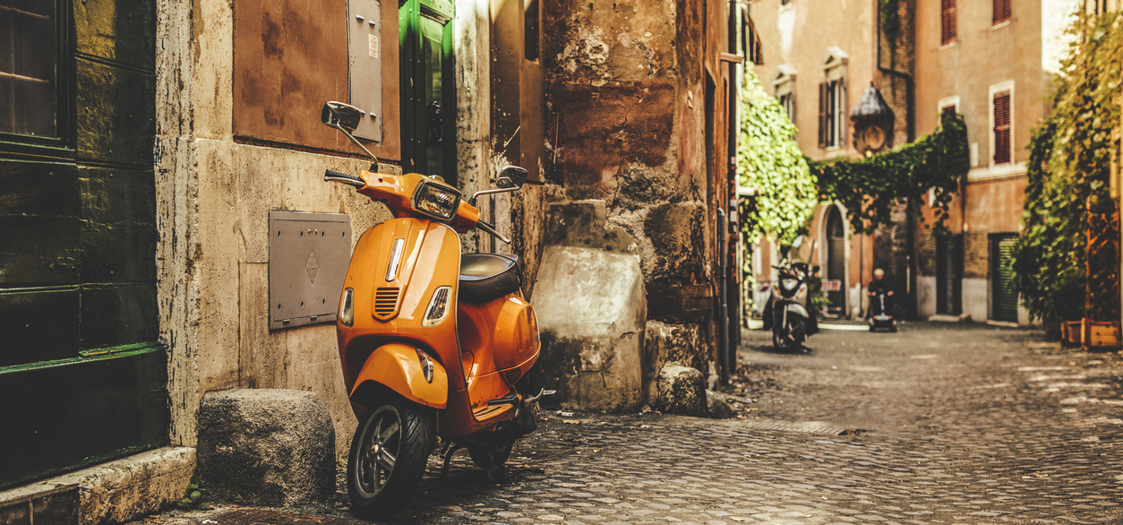 Image of Vespa in Street of Rome