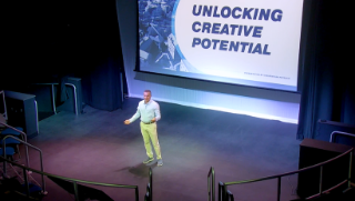 Christopher Petruzzi presenting in the University Center Studio.