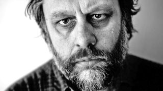 Black and white photo of Slavoj Žižek