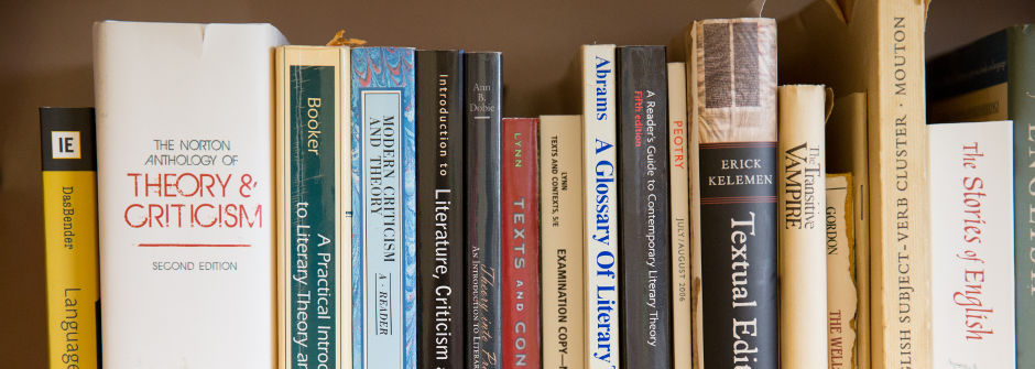 Books on a shelf of the English Department.