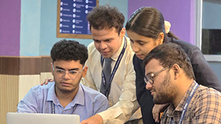 Tanya Sharma and students working on Hackathon
