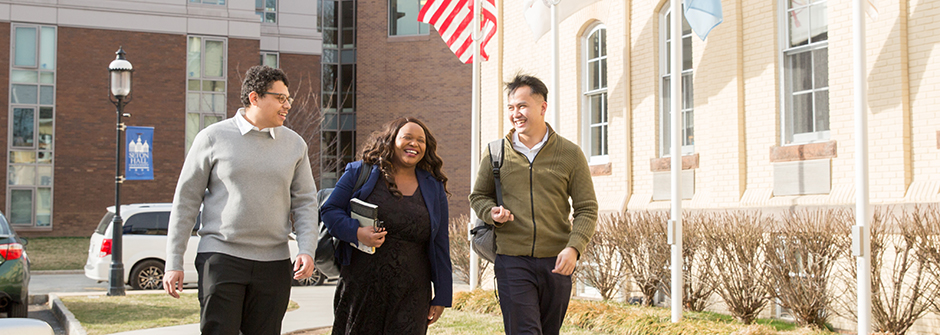 Diplomacy students walking across campus.