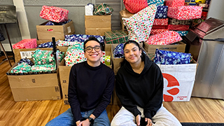 Toy Drive Volunteers and Wrapped Gifts