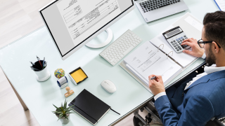 Image a professional working at a computer Image a professional working at a computer