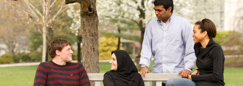 students outside on bench