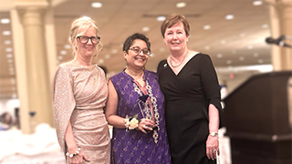 Munira Wells (center) honored at NJ Nursing Institure