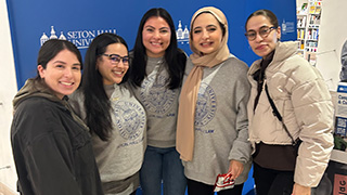 Image of Seton Hall students at NMOA event.