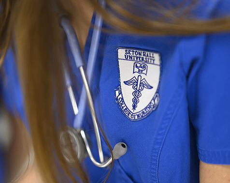 A photo of the logo on the scrubs of a Nursing student.