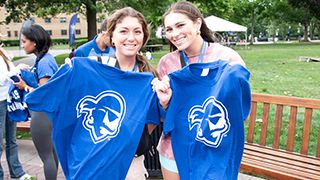 Two students with Pirate Logo tshirts Two students with Pirate Logo tshirts