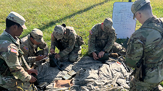 Pirate Battalion in dress uniforms performing a salute 