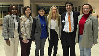 a group of roundtable leaders posing for a photo 