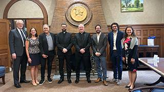 (Left to right): Erik Lillquist, Mary Kate Naatus,Héctor Lozada-Vega, Rector Gregory Woimbée, Monsignor Joseph Reilly, Jonathan Farina, Doug Cantelmo, Johanna Pan-Carr. 