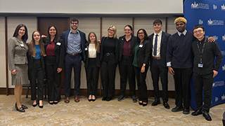Image of Accounting Club members and faculty at the event.