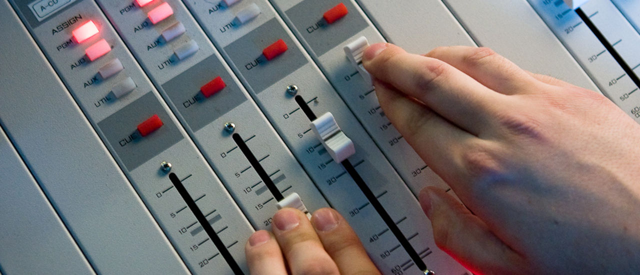 Hands on a soundboard