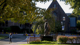 student walking on campus