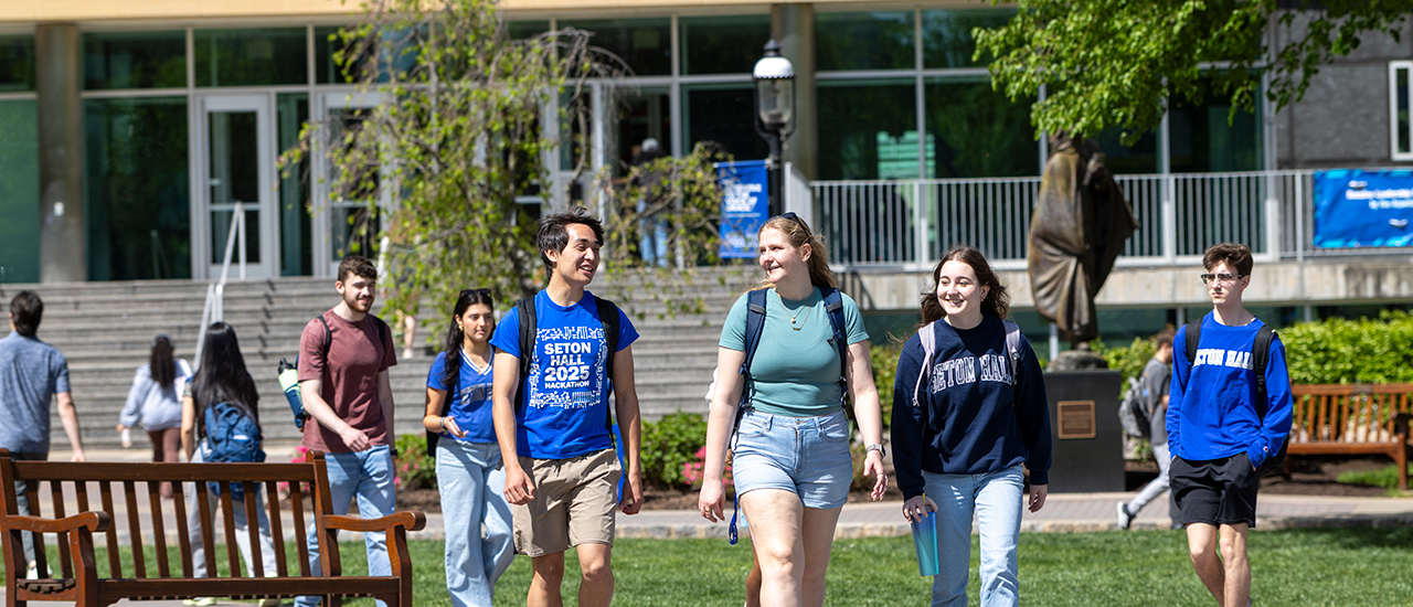 Students walking across campus near Jubilee Hall. 