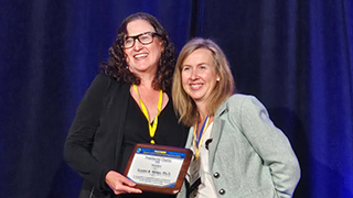 Susan Nolan receiving Presidential Citation