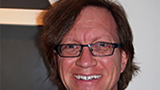 a headshot of Professor Tim Maudlin